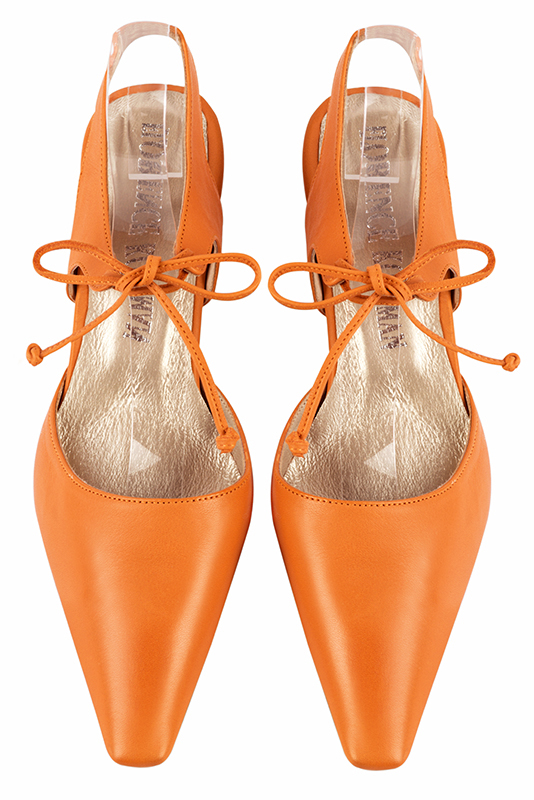 Apricot orange women's open back shoes, with an instep strap. Tapered toe. Medium spool heels. Top view - Florence KOOIJMAN